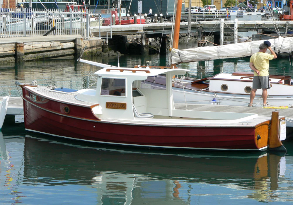 Timber displacement boat with trawler style cabin