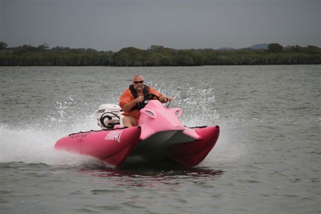 The author having fun on a multihull inflatable outboard boat