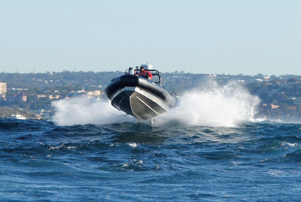 speedboat hovering over the water