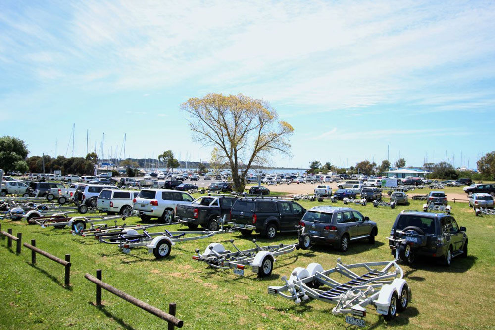 Boat trailers at launching ramp